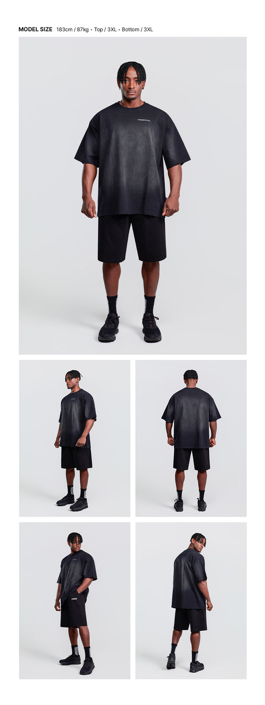 Small Logo Pigment Washed T-Shirt (Black) — model wearing the outfit